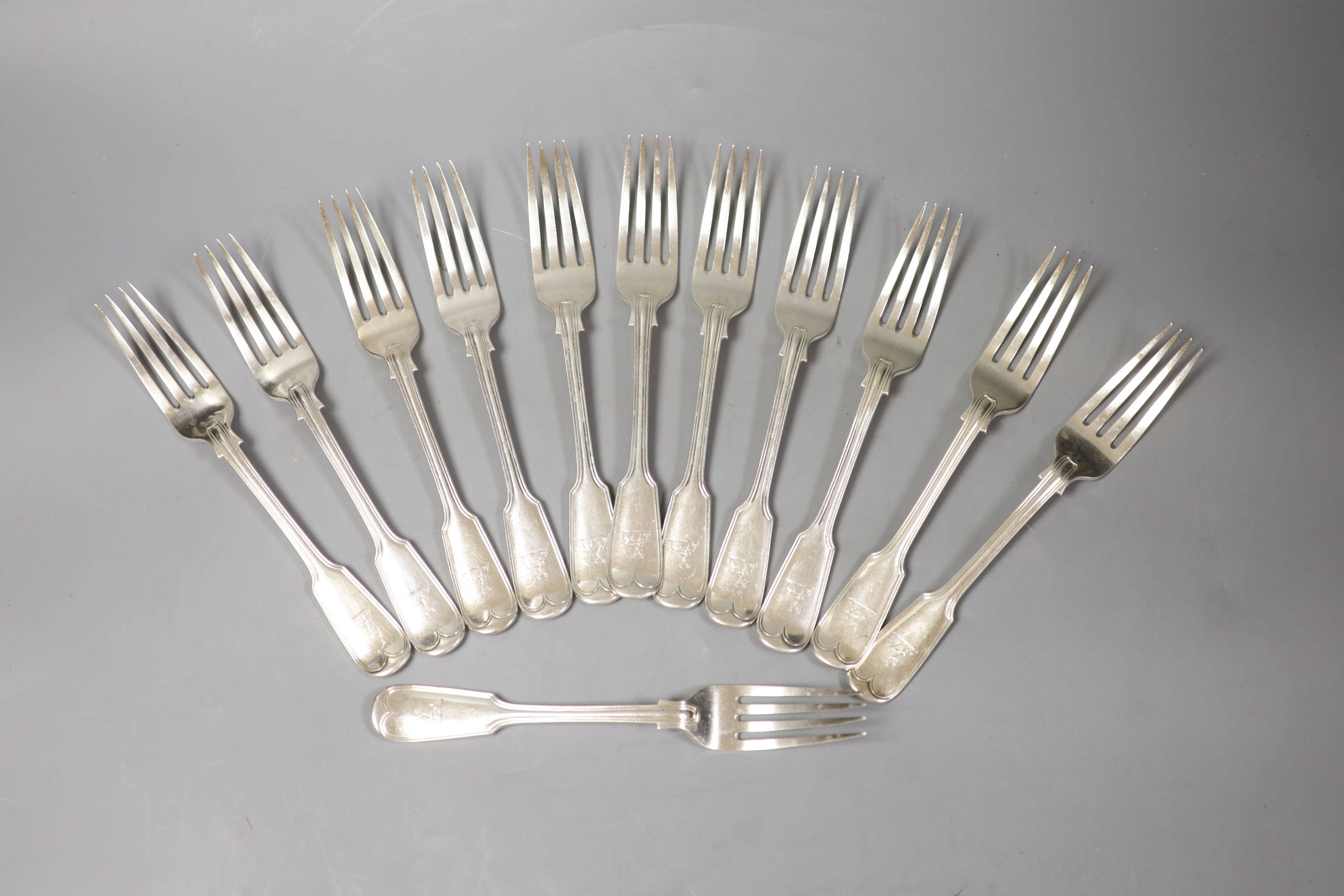 A set of twelve Victorian silver fiddle and thread pattern table forks, Joseph Maudley Jackson, London, 1890